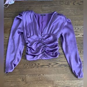 Purple nasty gal long sleeve satin blouse. Minor tear in the front. Size medium